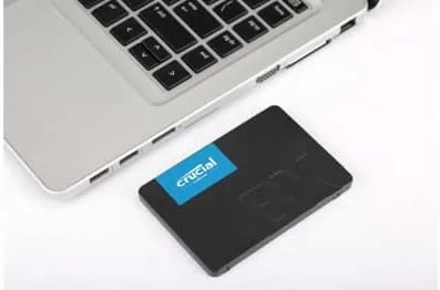 Crucial BX500 compared with an NVMe drive and a hard drive
