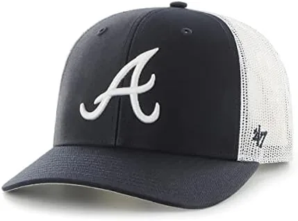 The cap being worn outdoors on a sunny afternoon