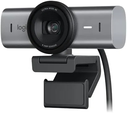 The Logitech MX Brio 4K webcam mounted on top of a monitor