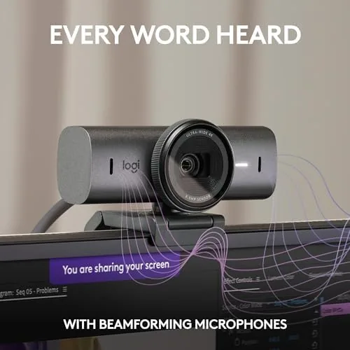 The Logitech MX Brio angled down in Show Mode over a desk