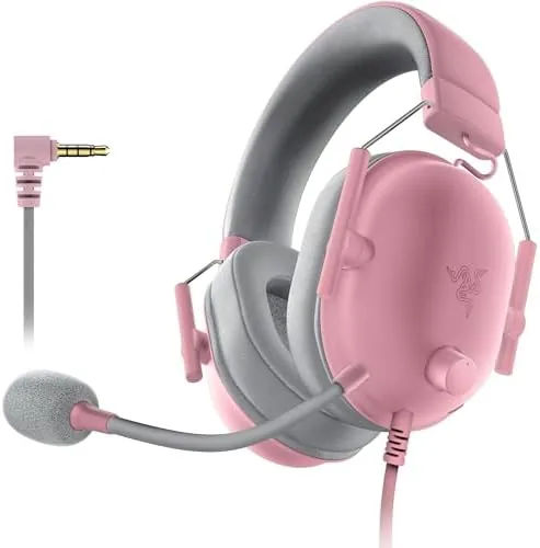 Razer BlackShark V2 X Quartz Pink headset resting on a desk