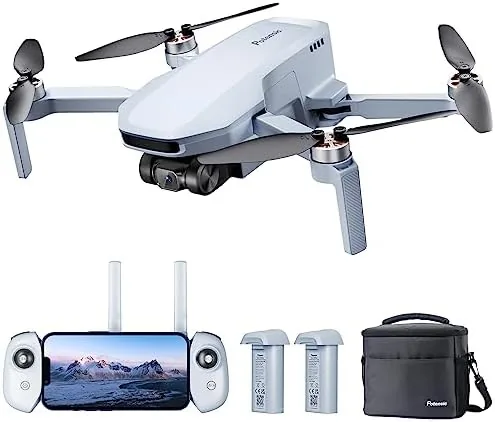 The folded Potensic ATOM SE drone resting next to its controller on a table