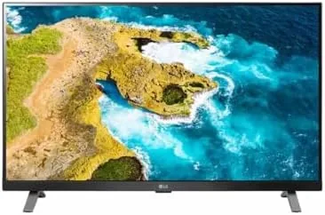 LG 27 inch smart TV monitor set up on a desk in a home office