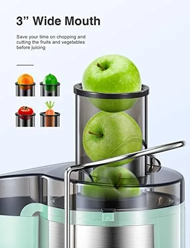 Fresh juice pouring from the spout into the glass pitcher