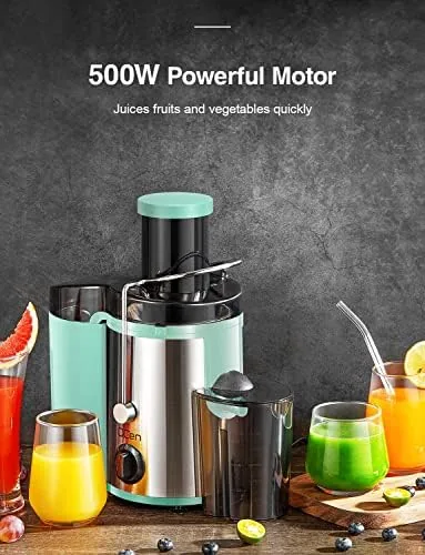 Glass of fresh juice beside the compact juicer on a small counter