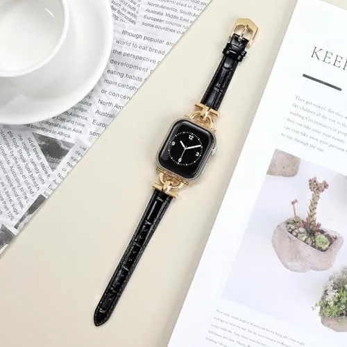 The leather band fitted to a 41mm Apple Watch with the gold hardware visible