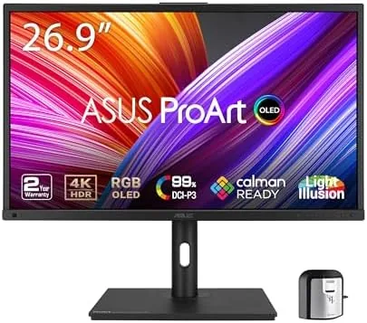 ASUS ProArt PA27DCE-K monitor on its stand in a studio showing the slim bezels