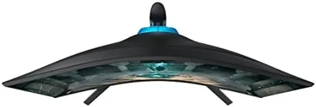 Gamer in a dark room playing on the Odyssey G65B with the rear light glowing