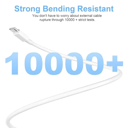 MacBook Air charging at a desk with the long USB C cable routed neatly
