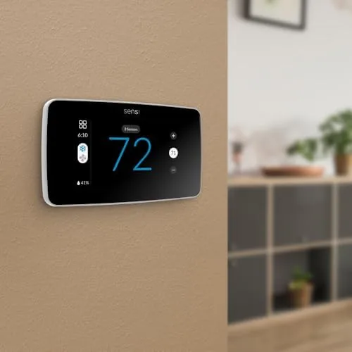 A wiring diagram being followed during the Sensi thermostat installation