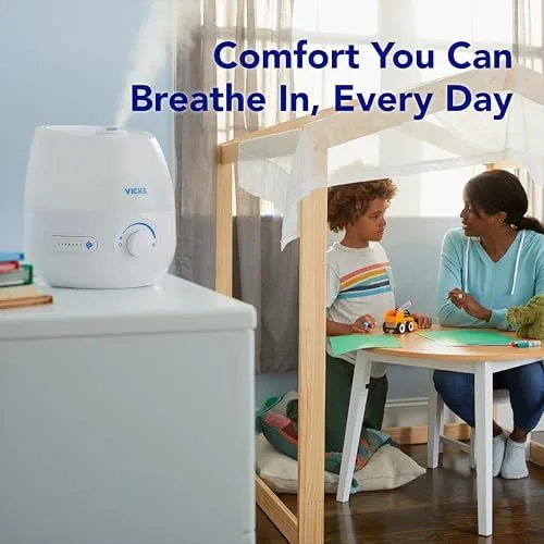 The Vicks Mini Filter Free Cool Mist Humidifier for Small Room in real use