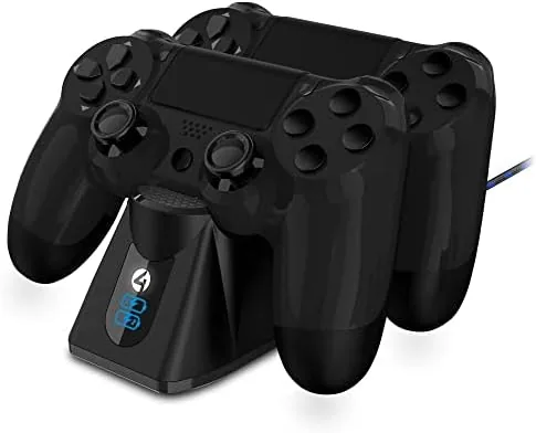 The charging dock showing both LEDs lit next to a PS4 console