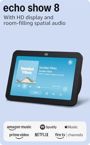The Amazon Echo Show 8 in charcoal on a living room sideboard