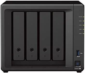 Synology DS923+ four bay NAS on a desk with its front drive bays visible