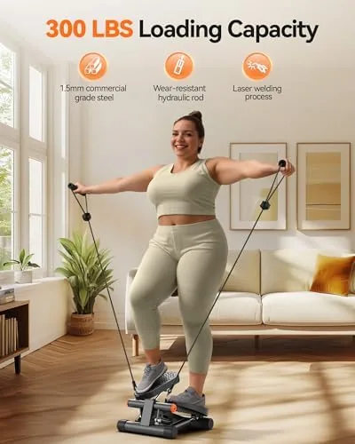 Person using the mini stepper while watching television in a living room