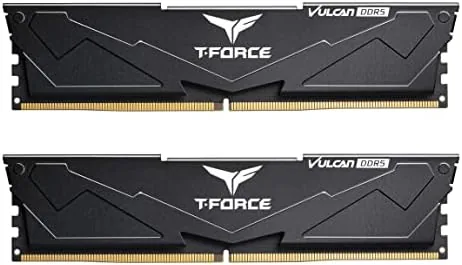Two TEAMGROUP T-Force Vulcan DDR5 modules side by side on a workbench