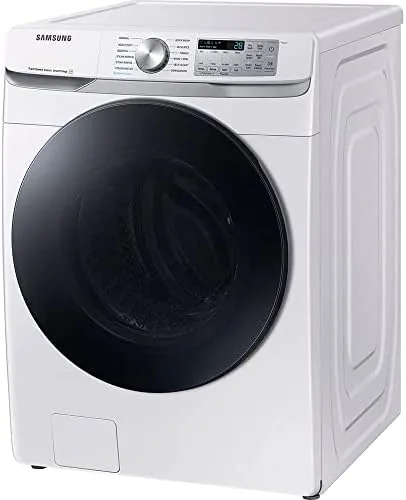 Washer viewed from the side next to a stackable dryer