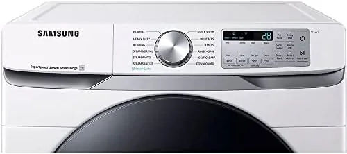 Stacked washer and dryer setup in a laundry closet