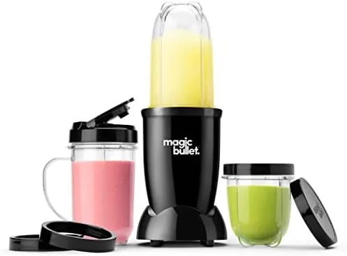 Magic Bullet 11 piece set laid out on a kitchen counter