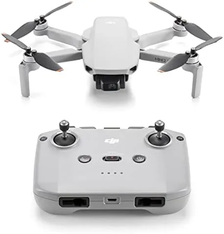 The Mini 2 SE hovering above an open grass field with the camera level
