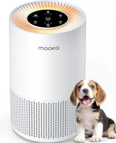 The white MOOKA H13 air purifier standing in a living room corner