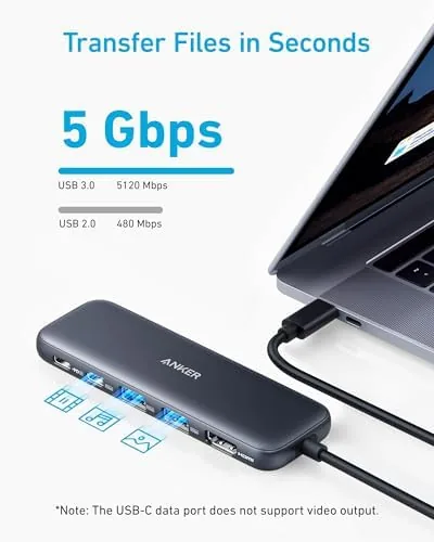 Anker 332 hub beside a laptop and an external SSD drive