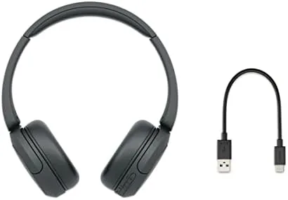 Headphones folded flat and packed in a bag for travel