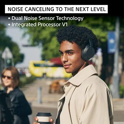 Close view of the white WH-CH720N ear cup showing the noise cancelling microphone openings