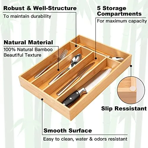 The organizer in an open kitchen drawer holding a full flatware set