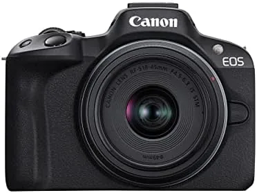 Canon EOS R50 mirrorless camera with the RF-S18-45mm kit lens on a table