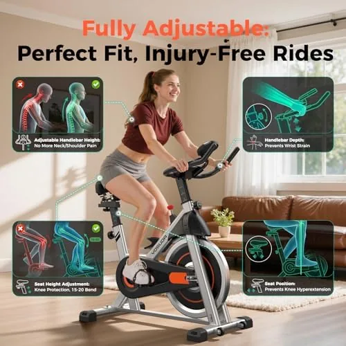 A rider cycling on the YOSUDA while watching a tablet class