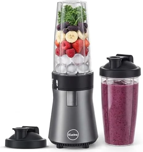 iCucina personal blender base with two 28oz cups and lids on a counter