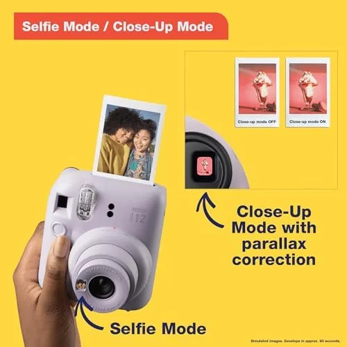 A hand rotating the lens barrel into selfie mode with the mirror visible