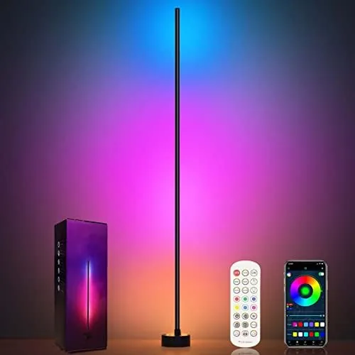 The Miortior corner floor lamp glowing in a living room corner next to a sofa