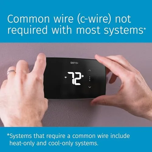 The thermostat wiring visible during installation with the power stealing setup