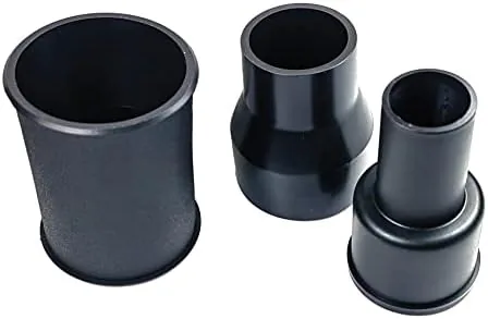 The three vacuum adapters laid out together on a garage workbench