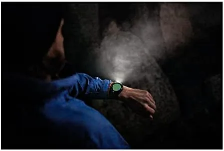 Close up of the fēnix 7X Pro case showing the buttons and the small flashlight LED at the top