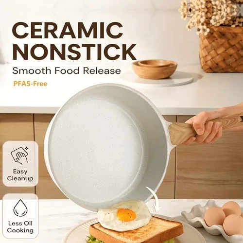A fried egg sliding out of a ceramic frying pan without sticking