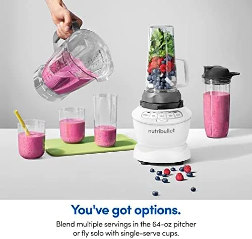 The blender vessels being cleaned with soapy water in the self-clean cycle