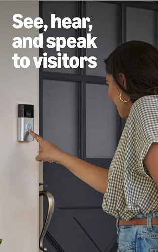Ring Battery Doorbell unboxing showing the doorbell, wedge, screws, and cable