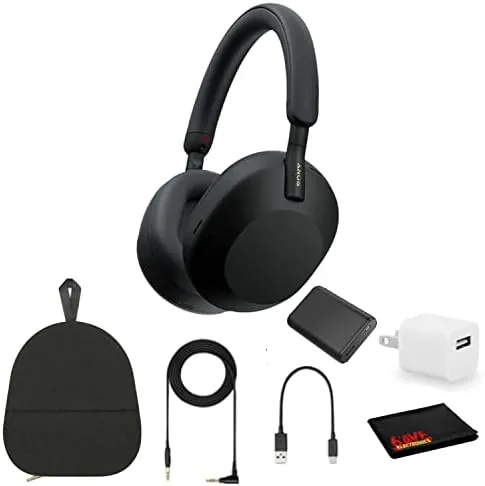 Sony WH-1000XM5 headphones with the included charging cube and portable charger