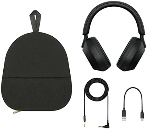 Sony WH-1000XM5 charging with the portable charger