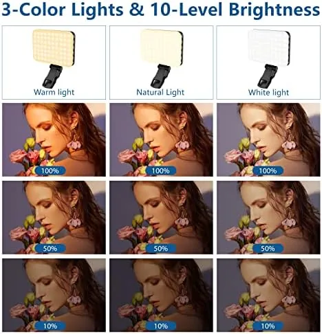 The selfie light on the tripod adapter standing on a desk beside a phone
