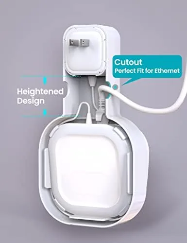 An eero 6 router seated in the cradle with the power cable routed neatly behind it