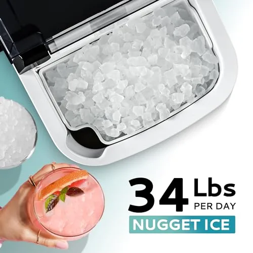 The top cover removed showing the ice basket and the interior of the ice maker