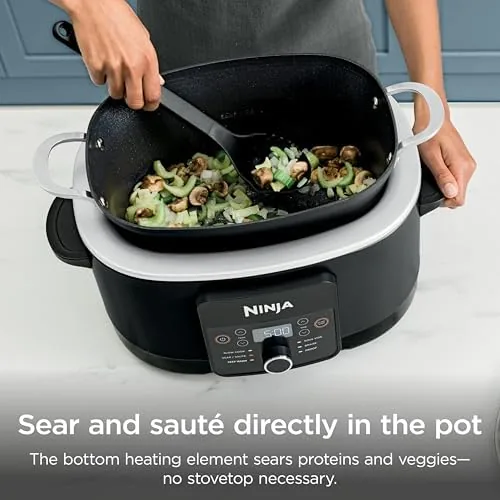 The PossibleCooker next to a basic slow cooker for size comparison