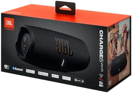 JBL Charge 5 WiFi speaker by a pool edge on a sunny day