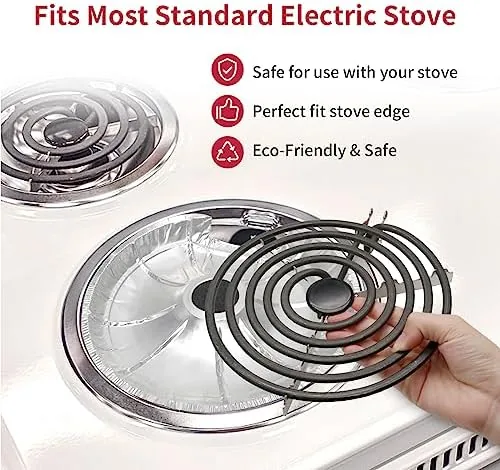 Stove top fully covered with fresh liners after a cleaning