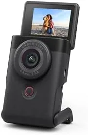 The Canon PowerShot V10 held upright in a hand showing its compact size