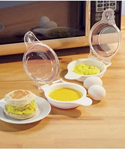 The egg cooker next to a skillet and a stovetop poacher for comparison